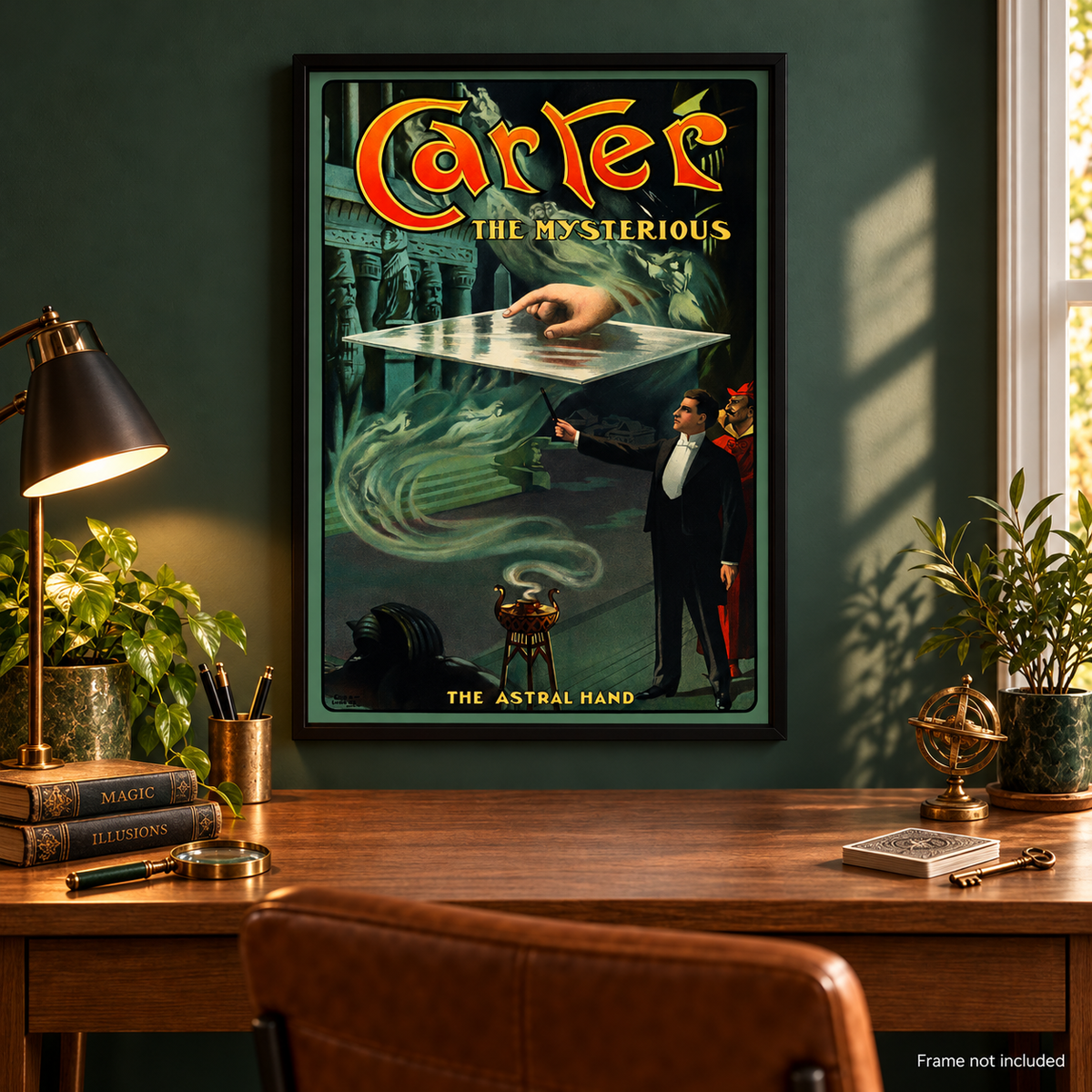 Carter the Mysterious The Astral Hand poster shown in black frame above a wooden desk with antique magic books and brass decor; frame not included